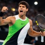 AI generated image of a tennis player celebrating with raised fist on an indoor court